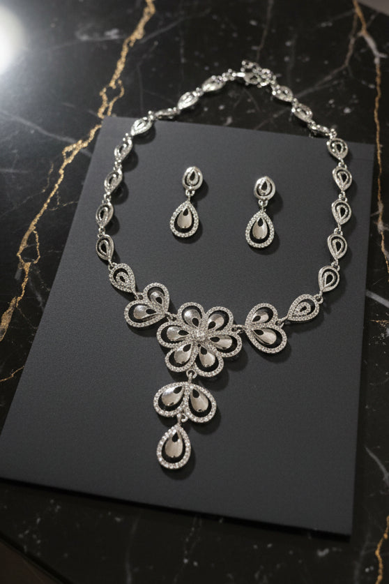 Conjunto pétalos plateados